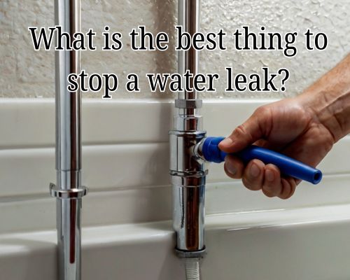 a plumber stopping leakage of a water pipe